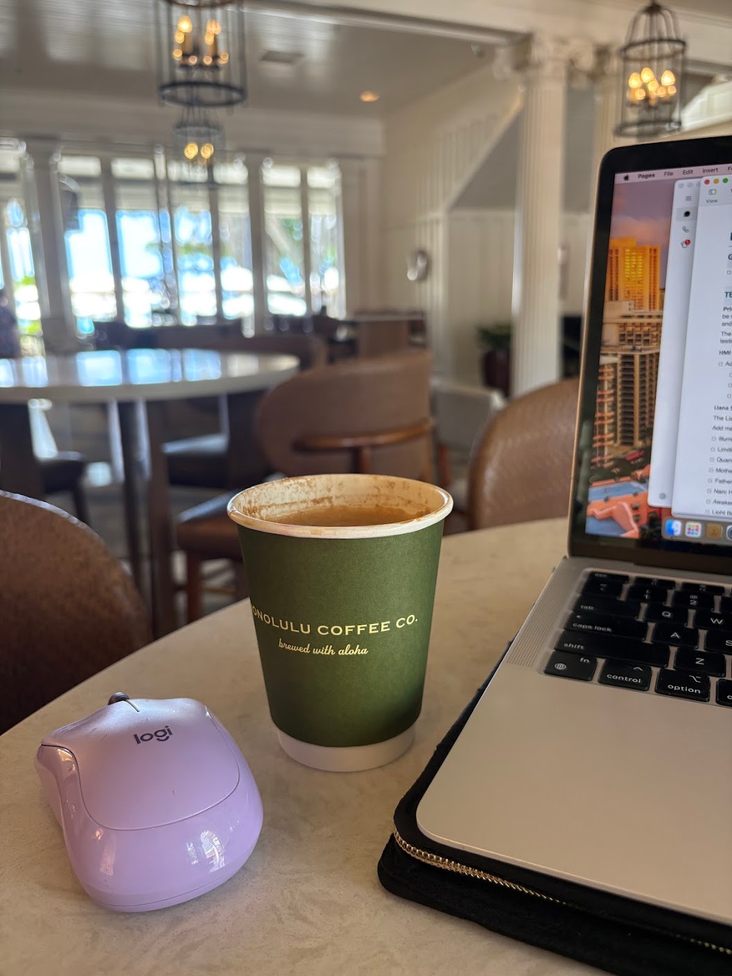 Coffee and laptop at Honolulu Coffee Co., Malana’s original photograph