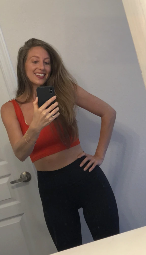 Malana in a red crop top during the health changes before her move to Hawaiʻi